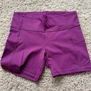lululemon athletica wonder Shorts size 12 in Magenta/Raspberry